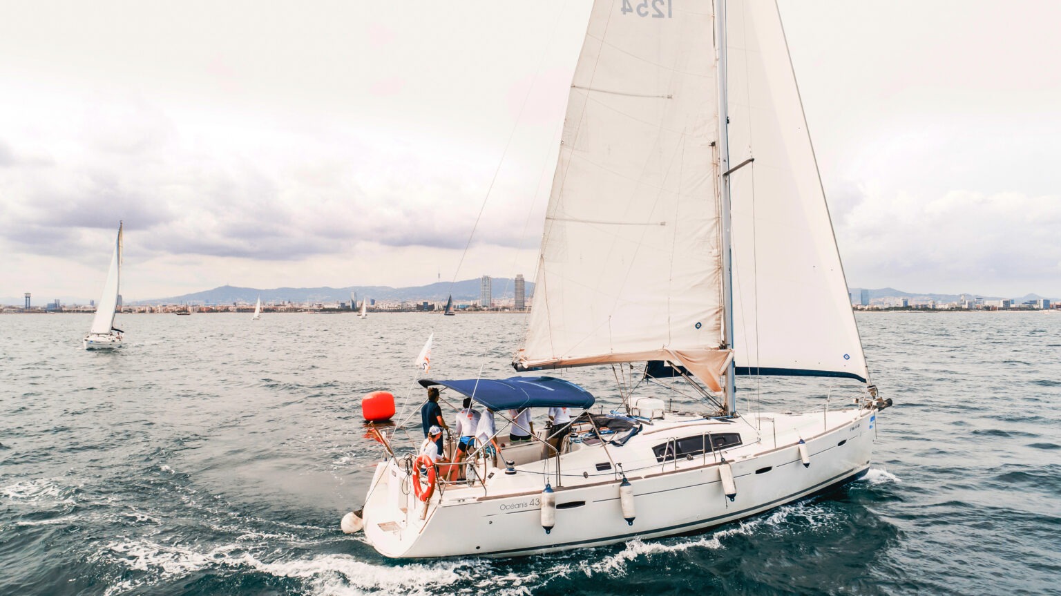 Sailing yacht on the Mediterranean Sea near Barcelona, Spain, with Veeva Systems team members aboard during the Generation Veeva global conference — an elegant capture blending business, leisure, and adventure under soft Mediterranean skies.Veeva Systems Barcelona, Generation Veeva global conference, corporate event photography Spain, luxury yacht photography, sailing Barcelona event photographer, Mediterranean team building, David Scarola Photography, global corporate photographer, executive retreat photography, destination corporate photography, Barcelona business events, professional event coverage Europe, brand storytelling photography, luxury travel and event photographer, Veeva Systems global culture.