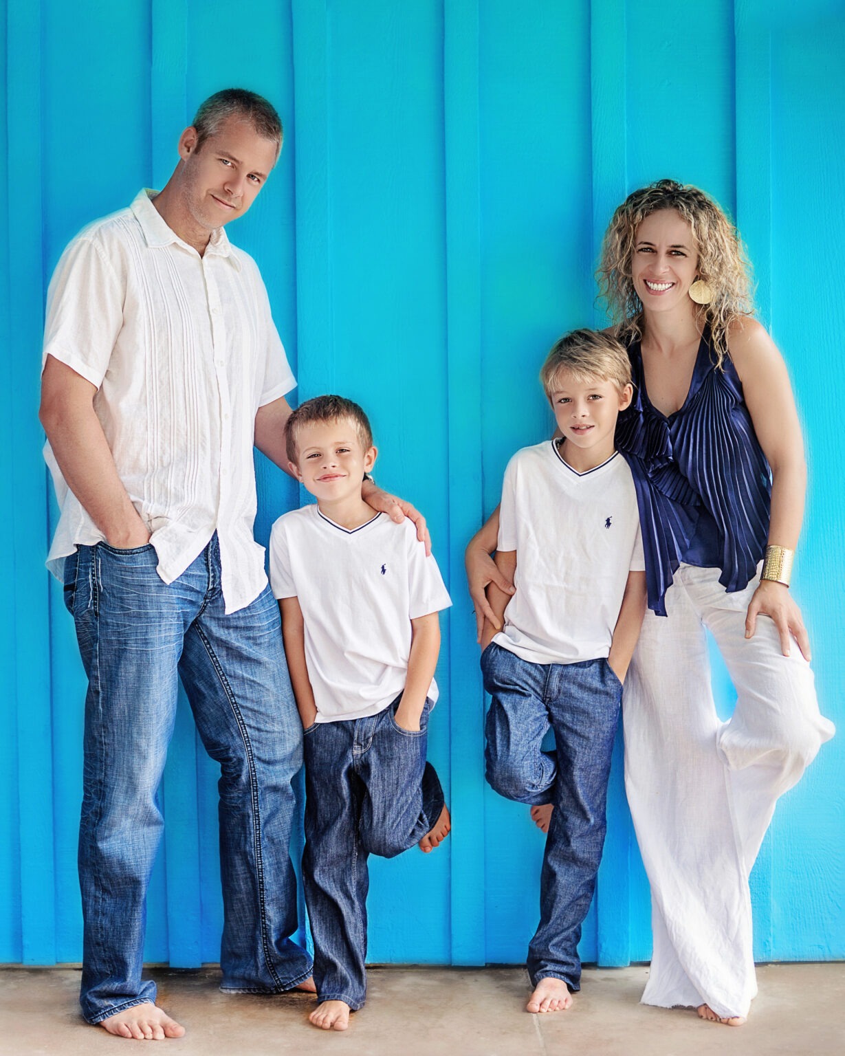 You can feel the joy in this mother's heart as she finally has her family together for the photo shoot. It took some time to plan it all out, get everyone's schedules organized with work, school and sports, but the time has come and David Scarola makes everything feel so enjoyable. Happy mom, happy wife, happy kids, and dad's on his best behavior! In Palm Beach or in Jupiter, David Scarola Photography is the best choice for family photo shoots.