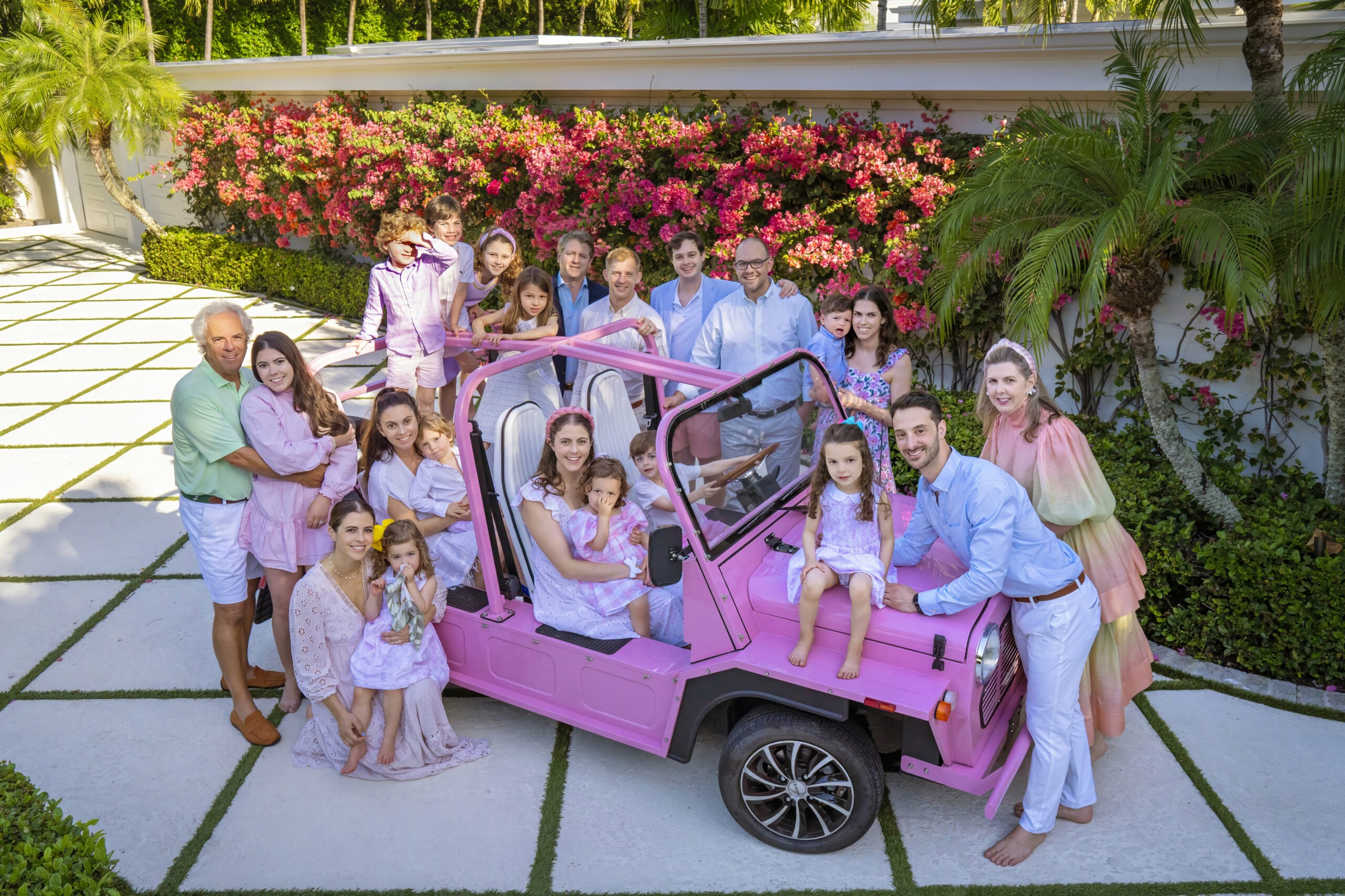 A beautiful family on Palm Beach Island posing for their Easter photo shoot. David Scarola working his magic getting a large family group into position, including the many young children, who just want to move and play and climb. Book your family portraits with David Scarola.
