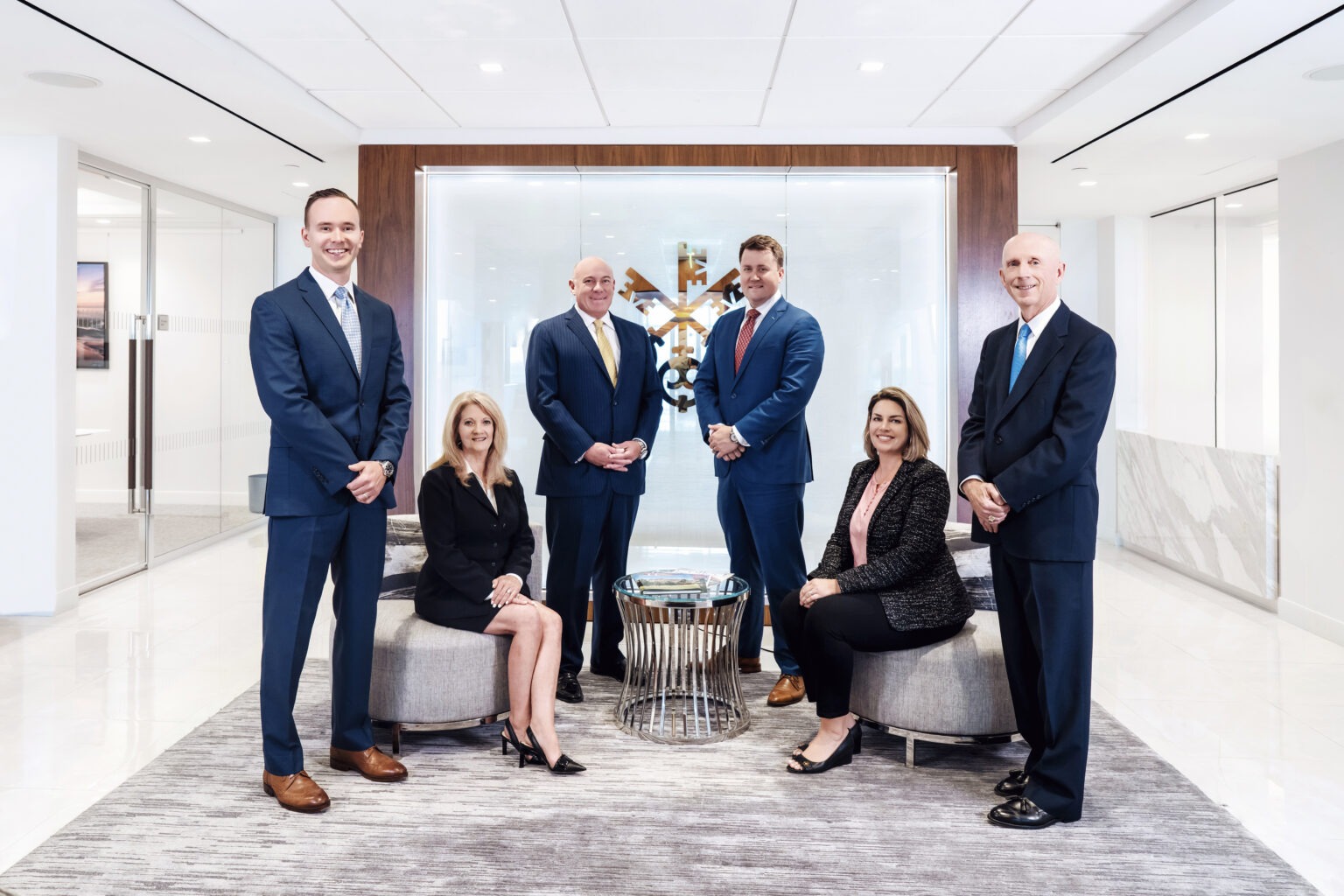 UBS Financial team portrait led by Trey Mahoney, photographed in their Palm Beach office by David Scarola Photography. Professional corporate group photo highlighting executive leadership, trust, and professionalism.