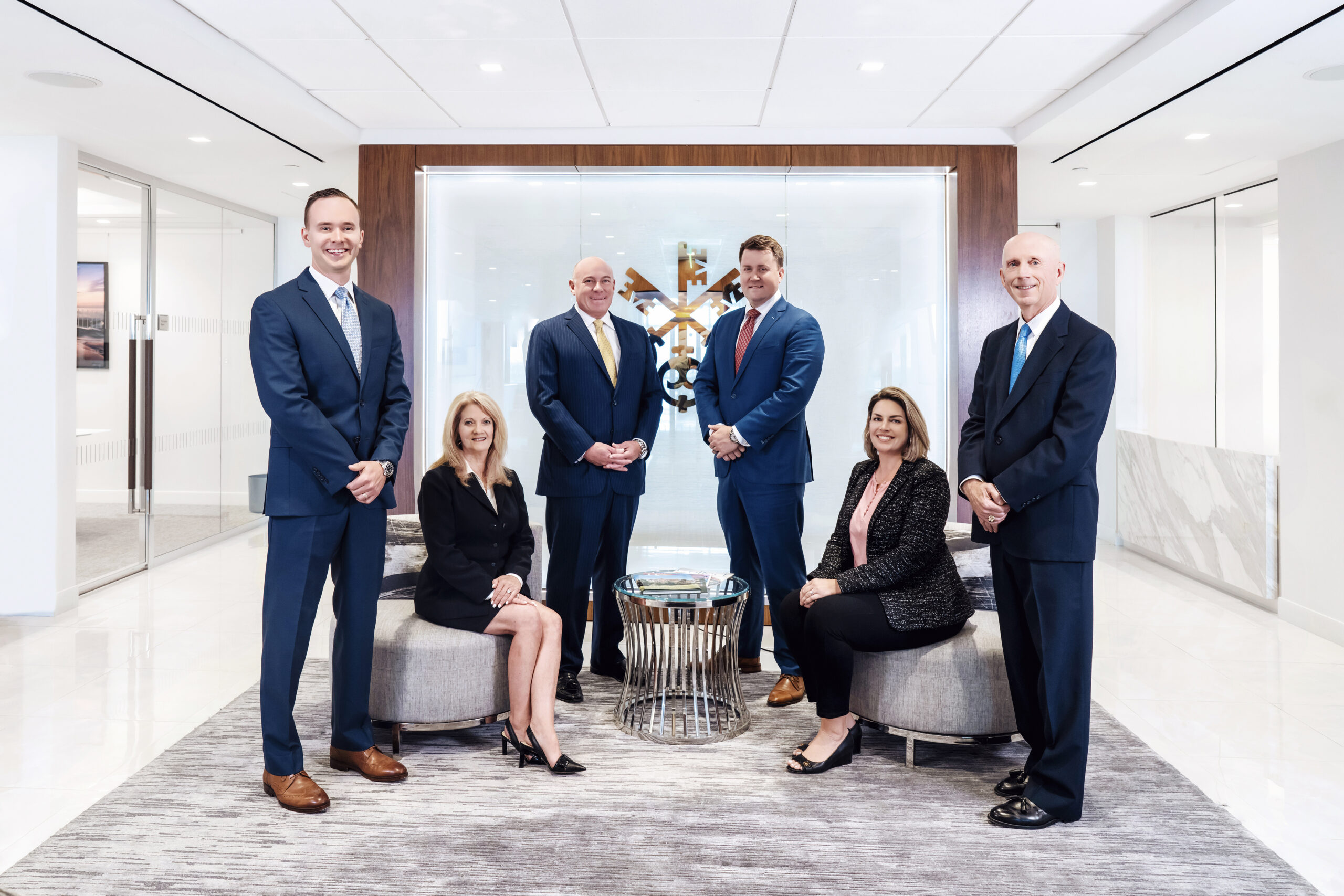UBS Financial team portrait led by Trey Mahoney, photographed in their Palm Beach office by David Scarola Photography. Professional corporate group photo highlighting executive leadership, trust, and professionalism.