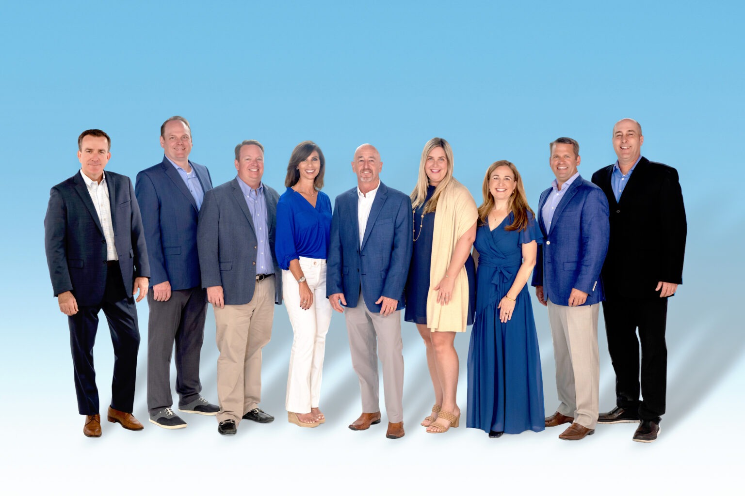 Platinum Properties Real Estate team portrait, photographed by David Scarola Photography. The leading Jupiter Island and Palm Beach Island real estate professionals stand together in coordinated blue tones against a clean gradient background, symbolizing trust, success, and luxury in South Florida real estate.Platinum Properties Jupiter Island, Palm Beach Island real estate photography, top real estate team Palm Beach, corporate photography Jupiter, business portraits South Florida, professional team photos Palm Beach, luxury real estate marketing photos, real estate brand photography, real estate headshots Palm Beach, corporate portrait photographer Florida, executive team photography Miami, real estate group photography, David Scarola Photography, professional photographer Jupiter Island.