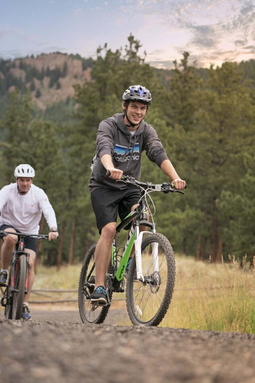 Corporate retreat adventure photography — Veeva Systems team members mountain biking through the scenic trails of Denver, Colorado, captured by David Scarola Photography. A moment of energy, teamwork, and leadership in motion.Veeva Systems Denver, corporate retreat photography, corporate adventure photography, global business culture, executive retreat photographer, Colorado corporate event photography, leadership photography, Denver event photographer, Generation Veeva, outdoor team building photography, authentic corporate storytelling, business culture photography, worldwide corporate photography, mountain biking corporate retreat, David Scarola Photography, Denver professional photographer, global event coverage, corporate lifestyle photography, brand storytelling imagery, connection through photography.