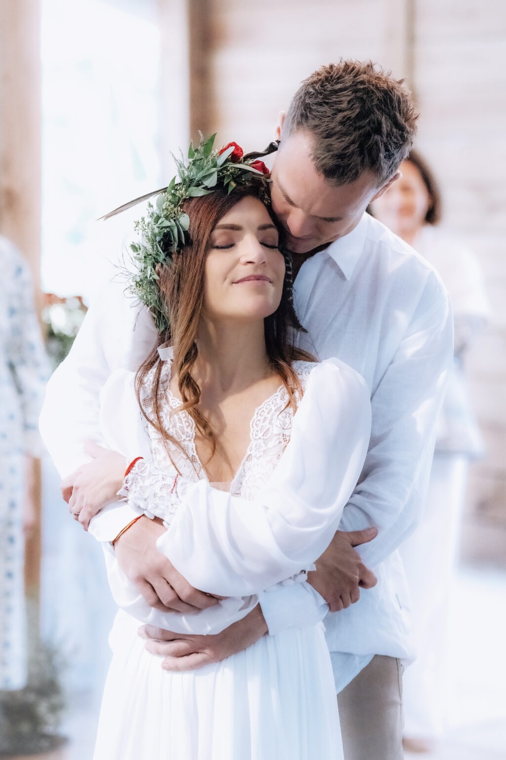 Bride and groom share a tender embrace during their wedding ceremony at Hawks Landing in Jupiter, Florida. Captured by acclaimed South Florida wedding photographer David Scarola, this intimate portrait radiates love, peace, and natural elegance in soft, ethereal light.