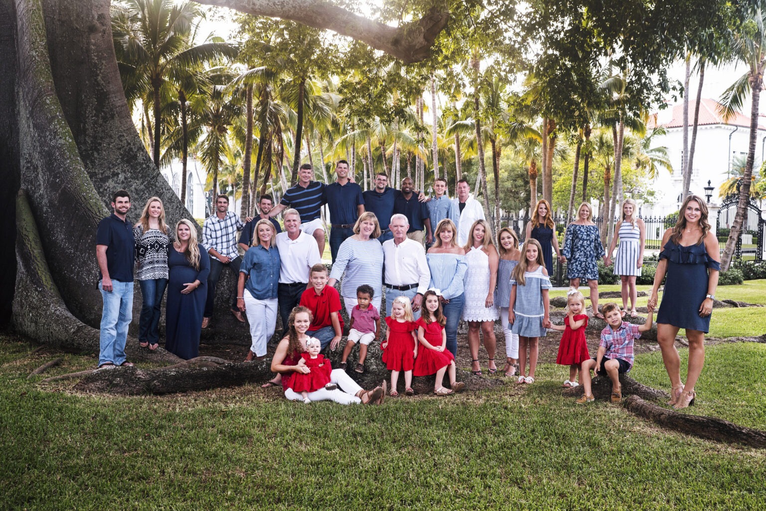 An extended family vacationing at the timeless and gorgeous Breakers Hotel on Palm Beach Island called David Scarola Photography to photograph them at the stunning and famous Banyan Tree at The Royal Poinciana Chapel.