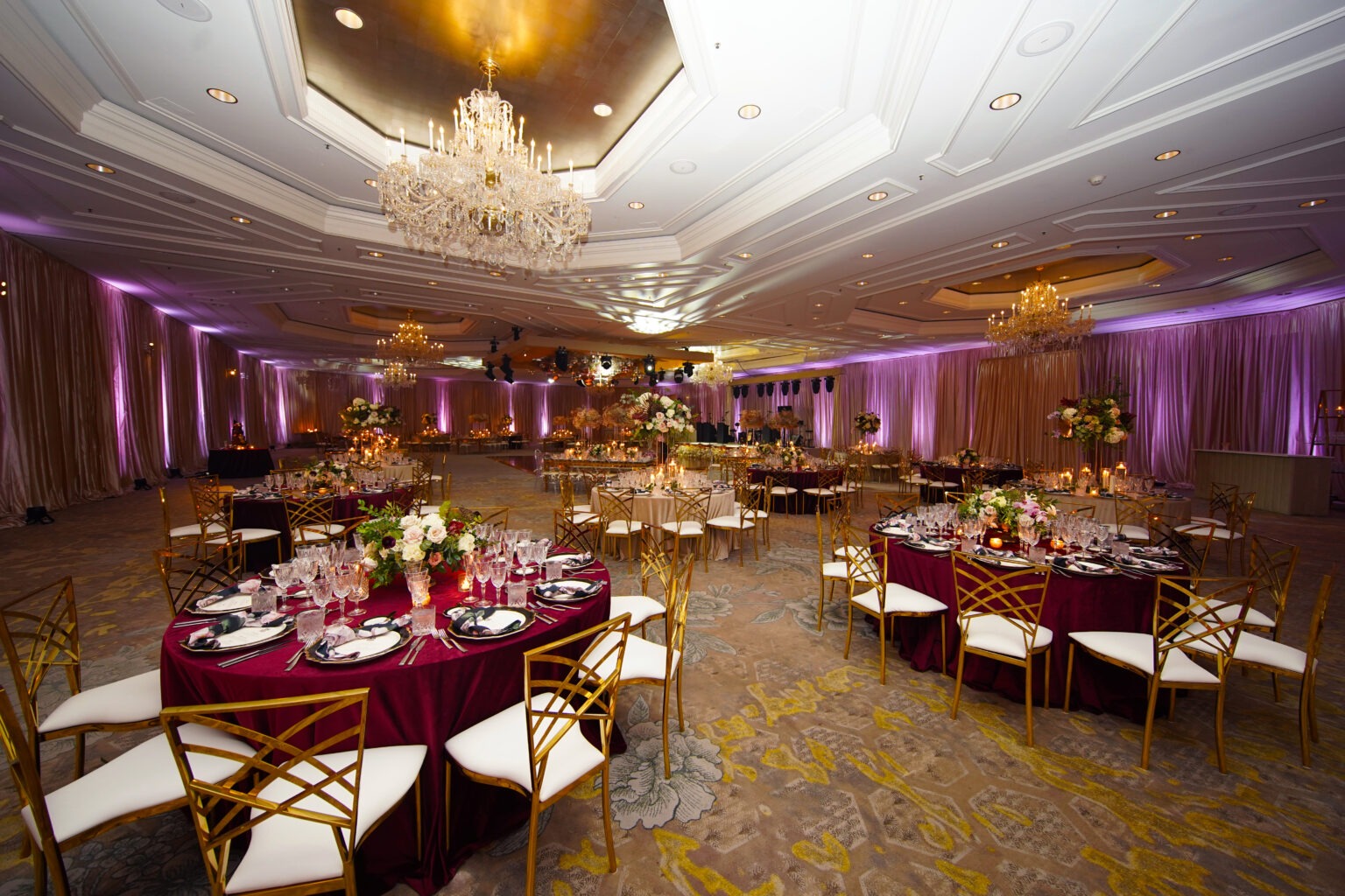 Grand Ballroom at The Eau Palm Beach Resort in Manalapan, Florida — a stunning luxury event venue set for a world-class celebration. Elegant chandeliers, gold accents, floral centerpieces, and rich décor captured in exquisite detail by David Scarola Photography, the premier choice for global luxury event coverage.Grand Ballroom at The Eau Palm Beach Resort in Manalapan, Florida — a stunning luxury event venue set for a world-class celebration. Elegant chandeliers, gold accents, floral centerpieces, and rich décor captured in exquisite detail by David Scarola Photography, the premier choice for global luxury event coverage.