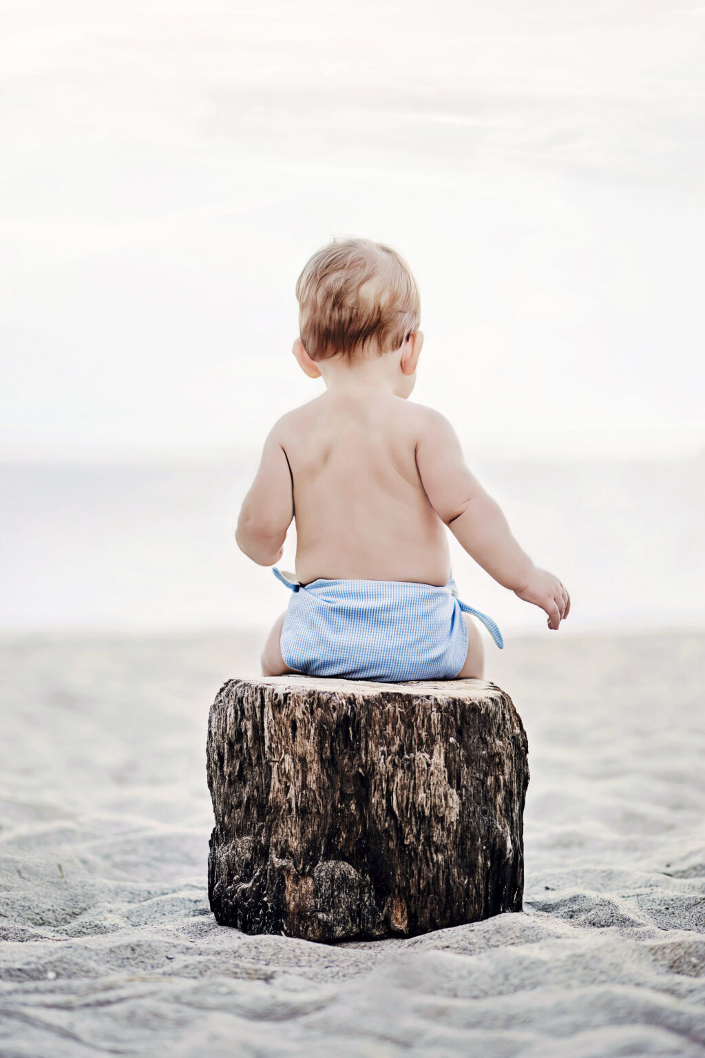 When your gorgeous baby boy can finally sit up, definitely take him to the beach, on Palm Beach Island, or Jupiter Island, for a family photo shoot with famed family photographer, David Scarola.