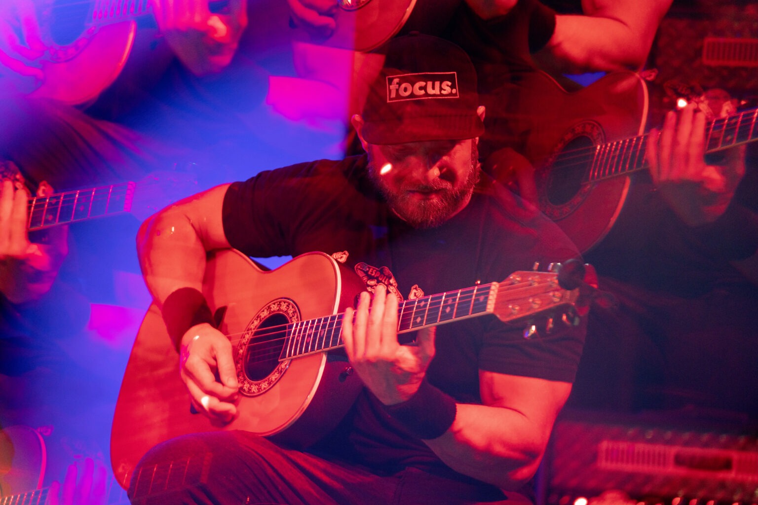 Live concert photography of Disbarred band performing at iTHINK Amphitheatre — guitarist captured mid-performance in vibrant red and blue stage lighting by David Scarola Photography. Powerful editorial-style event imagery showcasing Florida’s top live music photographer for corporate and entertainment events.iTHINK Amphitheatre concert photography, Disbarred band photos, live event photographer Florida, Palm Beach corporate and entertainment photographer, David Scarola Photography, professional concert coverage, music festival photography, creative event photojournalism.