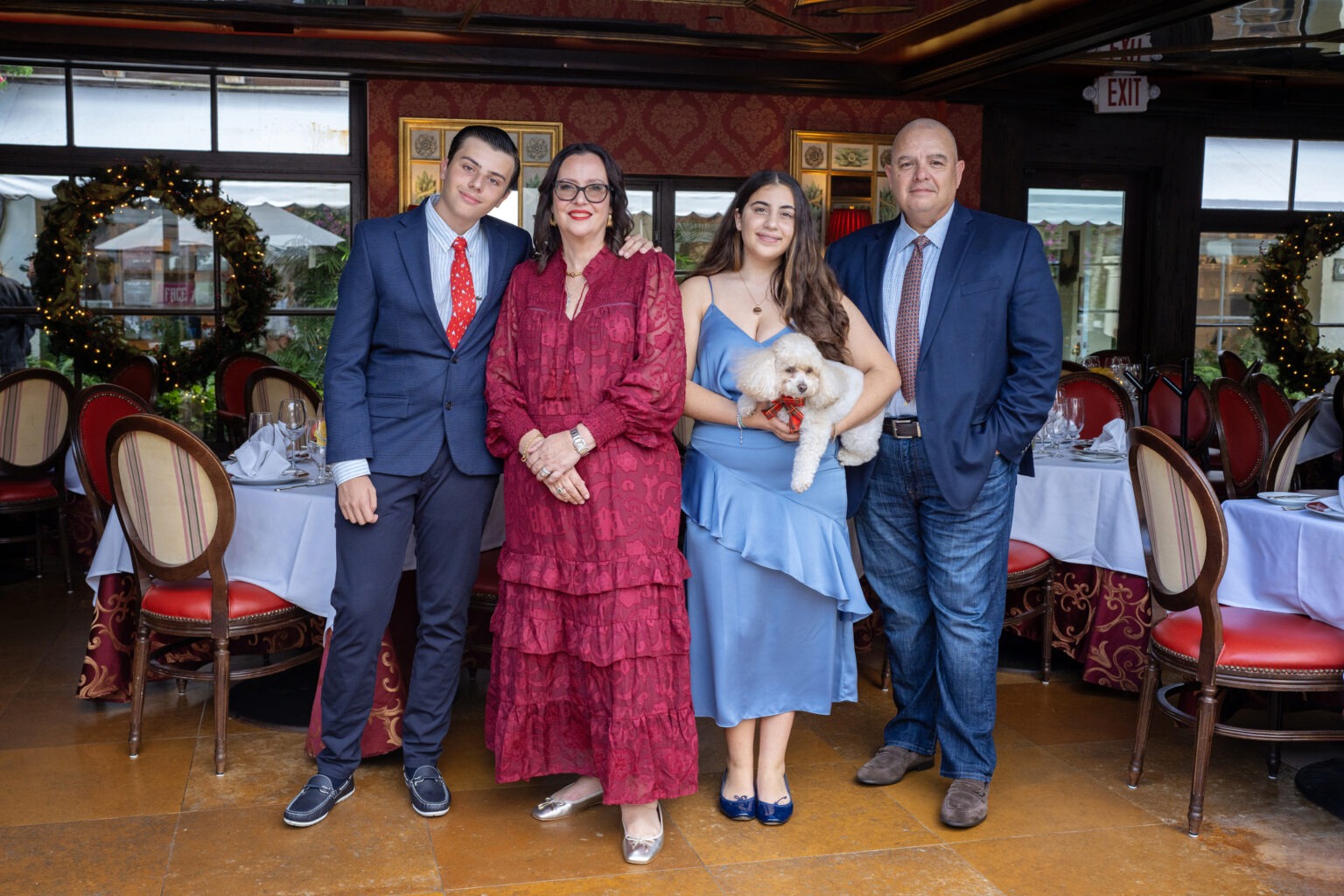 The Duran Family, renowned Palm Beach Island restaurateurs, photographed inside Renato’s Restaurant in Palm Beach by David Scarola Photography. Elegant family portrait celebrating legacy, hospitality, and luxury dining excellence in South Florida.