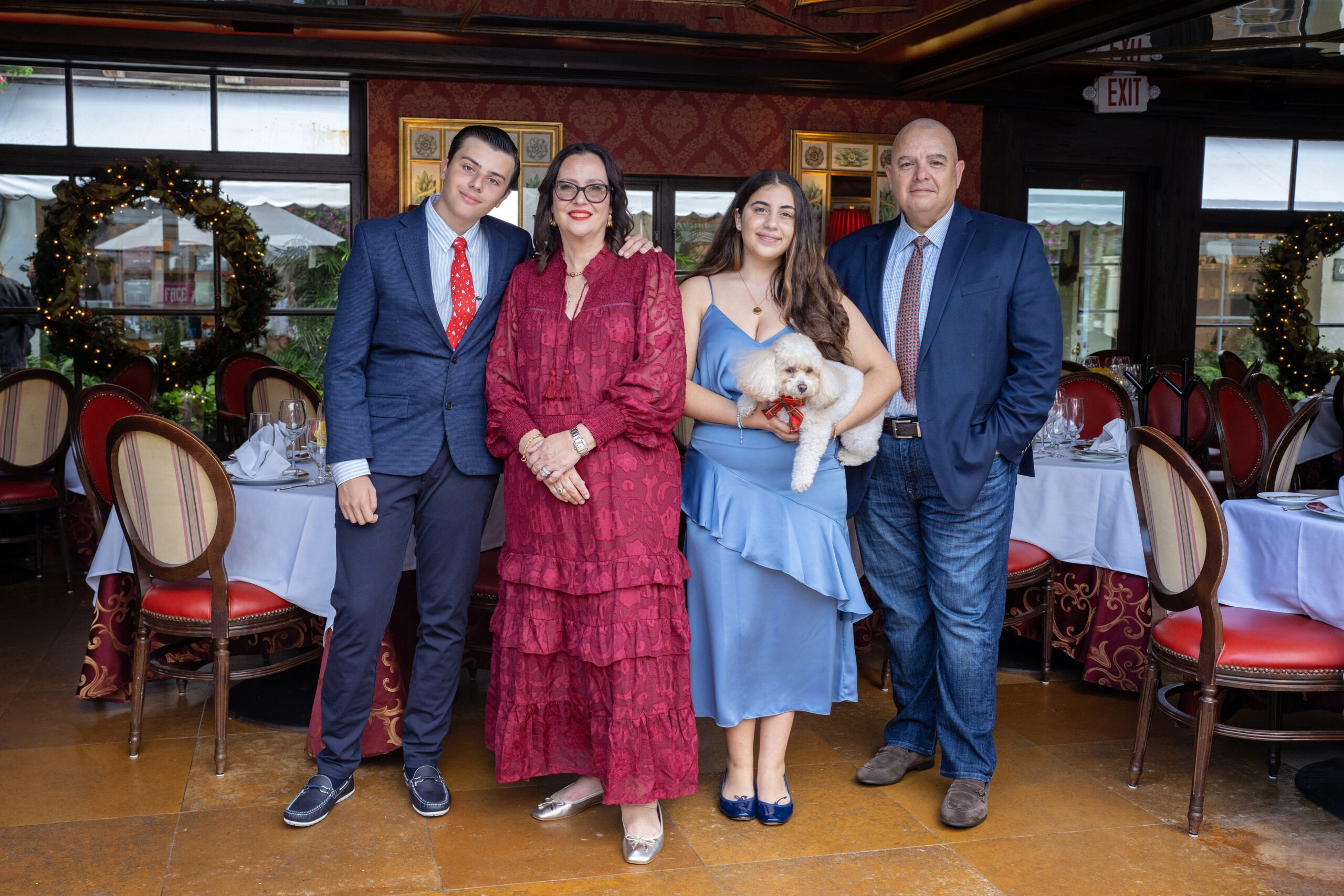 The Duran Family, renowned Palm Beach Island restaurateurs, photographed inside Renato’s Restaurant in Palm Beach by David Scarola Photography. Elegant family portrait celebrating legacy, hospitality, and luxury dining excellence in South Florida.