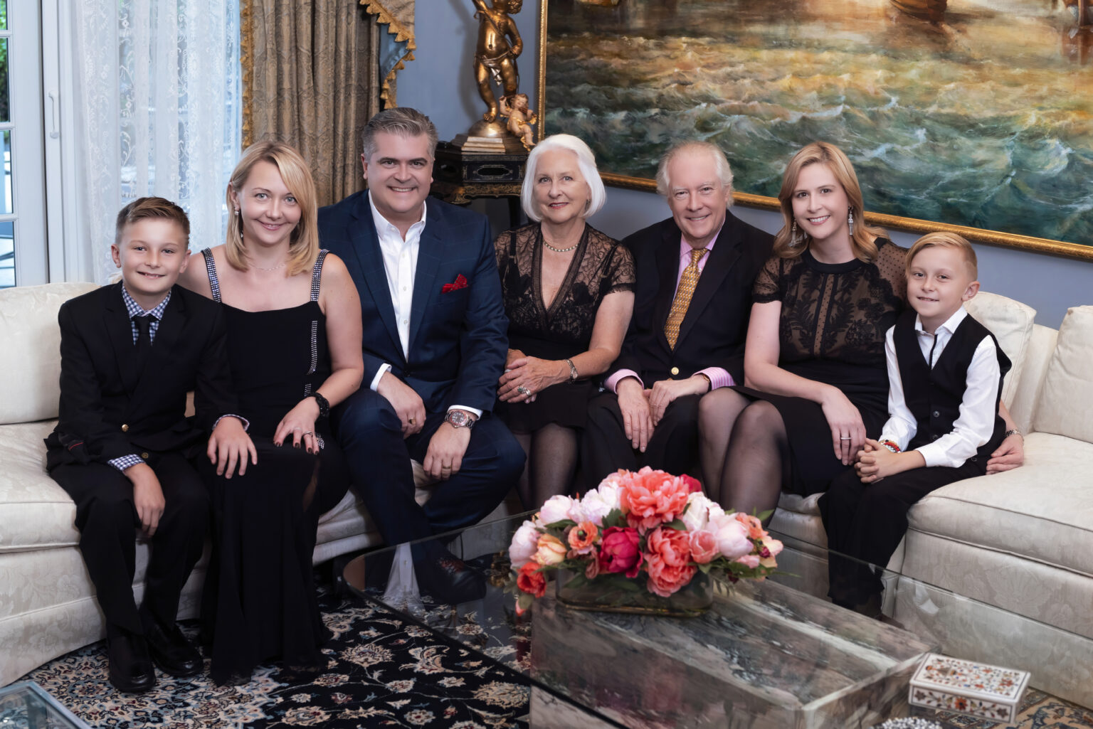 A lovely and beautiful Jupiter Island family following the instructions of famed family photographer, David Scarola, during their annual family photo shoot in their Jupiter Island home in one of Florida's best and oldest golf and tennis communities, Jonathan's Landing.
