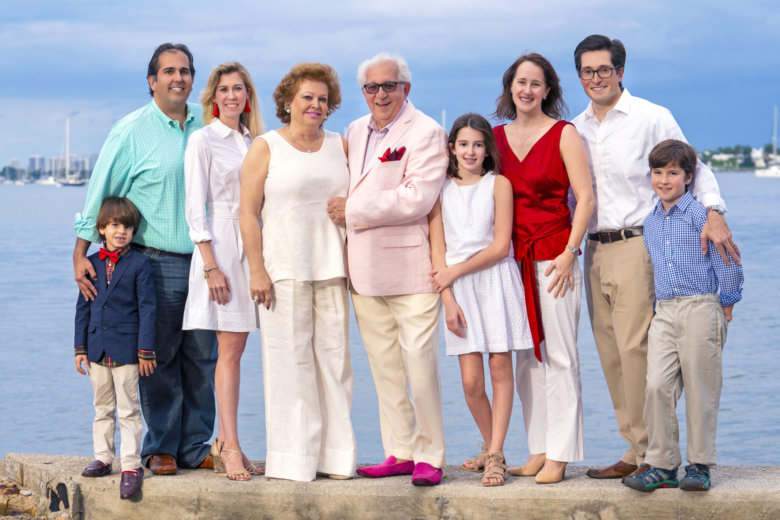 This family portrait by David Scarola, captured on Palm Beach Island, near the Sailfish Club, will be cherished forever as it is the last one taken prior to the passing of the honored and revered patriarch of the family. David's clients trust him to be a part of the family and throughout working with David during a family shoot, the moments become full of heart and love and the essence of that is felt, and made observable and photographable.