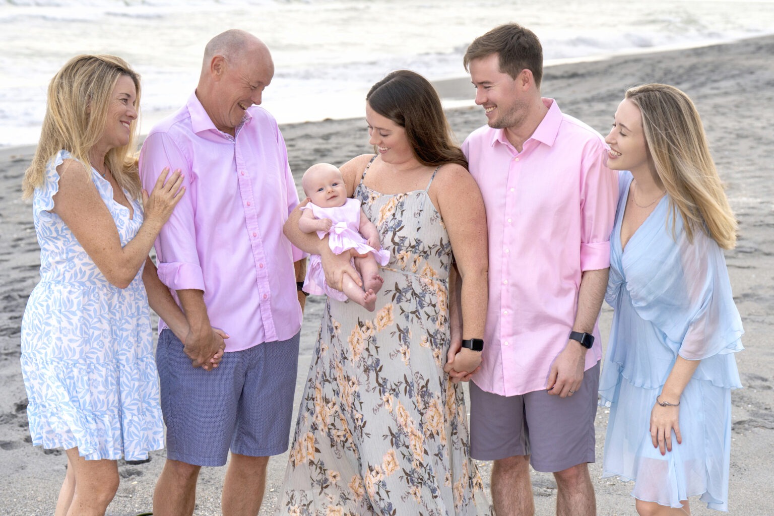 Everybody loves the baby girl, she's the cutest, sweetest, most photogenic little thing ever, and David Scarola Photography does an amazing job capturing how precious she is and just how much every member of the family loves her. This Jupiter Beach family photo shoot will be remembered forever.