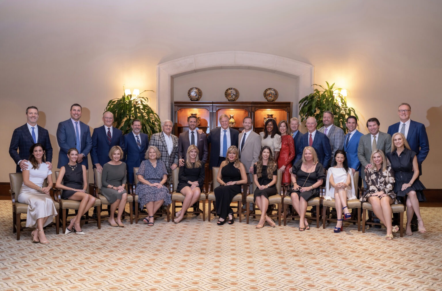 Corporate group photo of the shareholders and partners of Searcy Denny Scarola Barnhart & Shipley law firm during their annual dinner at The Bear’s Club, captured by David Scarola Photography.Searcy Denny Scarola Barnhart Shipley, law firm shareholders dinner, The Bear’s Club Jupiter Florida, Palm Beach corporate event photographer, professional law firm photography, corporate portrait South Florida, executive team portraits, business event photography Palm Beach, legal leadership photography, Jupiter Florida photographer, David Scarola Photography, professional headshots and corporate branding Florida.
