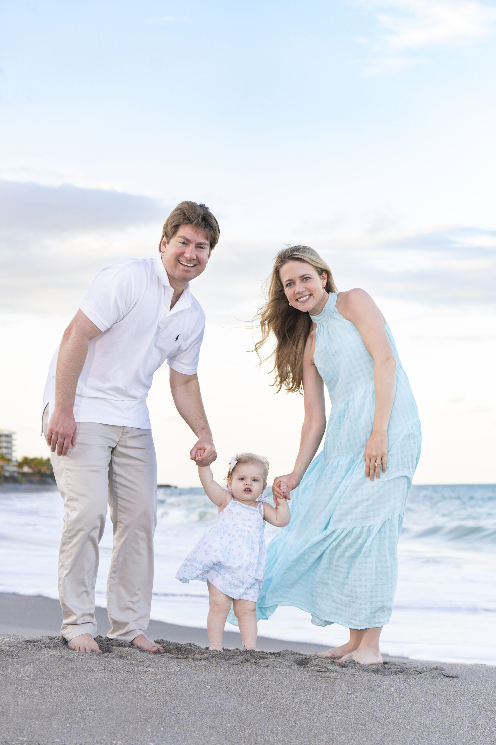 There’s something timeless about the first portraits of a young family — the way love, laughter, and discovery all shine at once. Captured along the serene shores of Palm Beach and Jupiter Island, this image embodies David Scarola Photography’s signature approach to fine portraiture: natural light, authentic emotion, and effortless elegance.family photography Palm Beach, Jupiter Island photographer, baby portraits on the beach, fine art family photography, professional portrait artist Florida, master photographer, natural light photography, baby’s first portraits, Palm Beach family session, Jupiter family photographer.